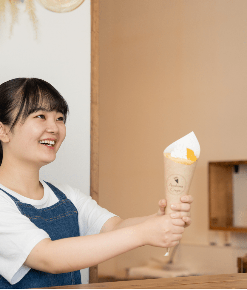 Woman holding a crepe