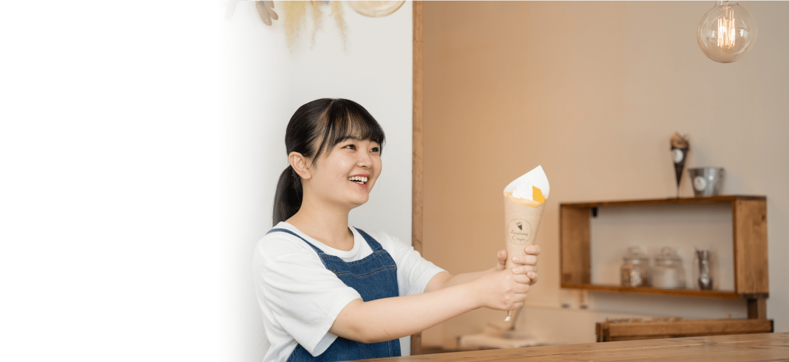 Woman holding a crepe